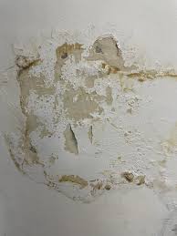 Spalling concrete and damaged plaster on a ceiling — building repair scope by Shieldguard Singapore