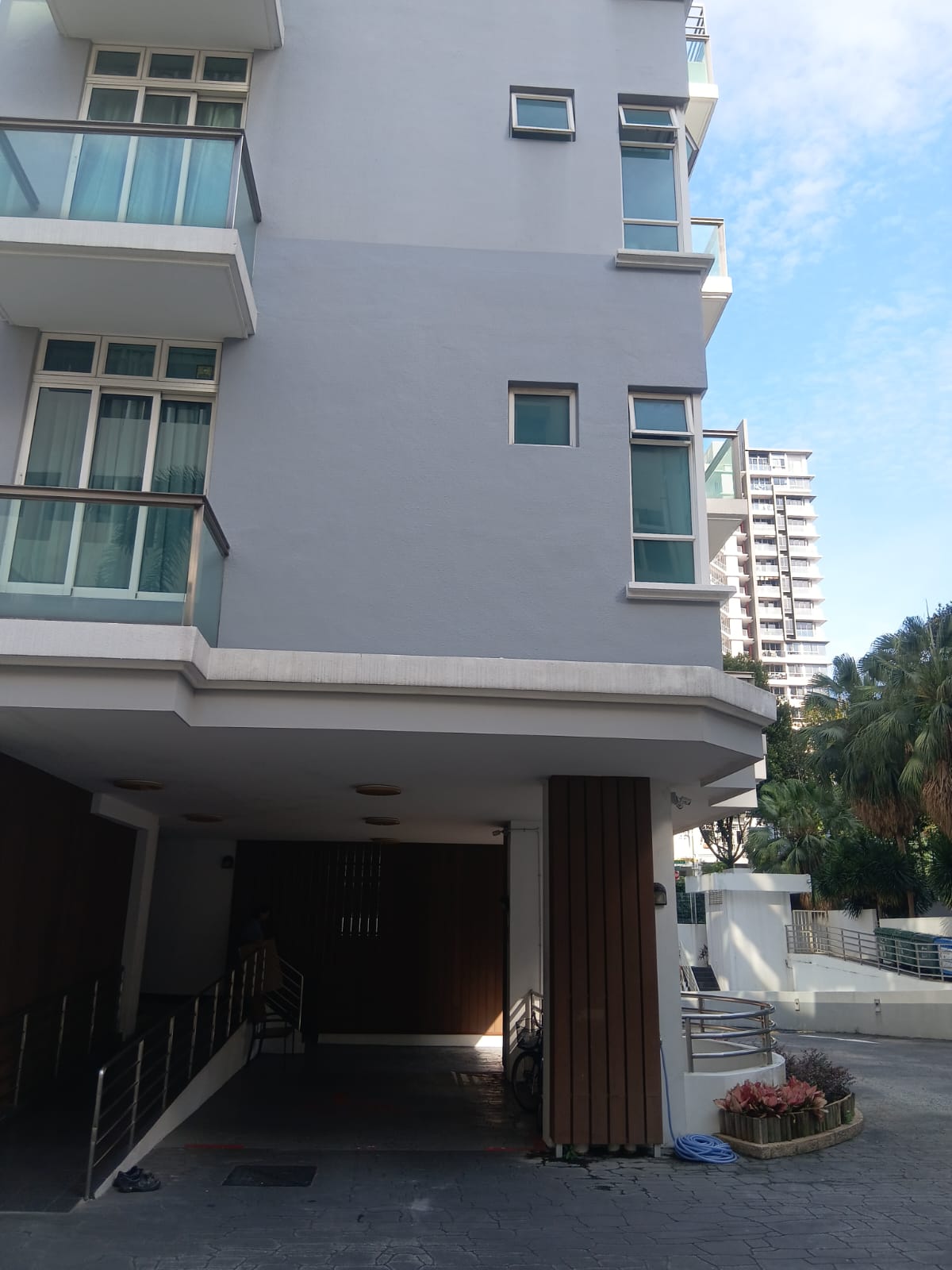 Newly painted and sealed condominium facade in Singapore — elastomeric external wall waterproofing by Shieldguard